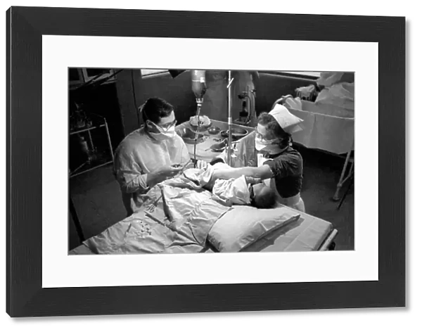 Hospital operation hearts. Babys life saved by blood transfusion. October 1946 O5112-002