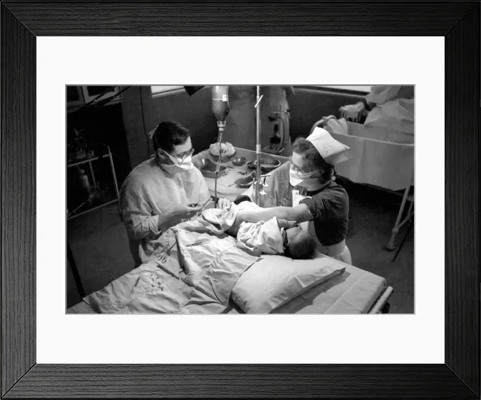 Framed Print : Hospital operation hearts. Babys life saved by blood transfusion. October 1946 O5112-002 Framed Print : Hospital operation hearts. Babys life saved by blood transfusion. October 1946 O5112-002