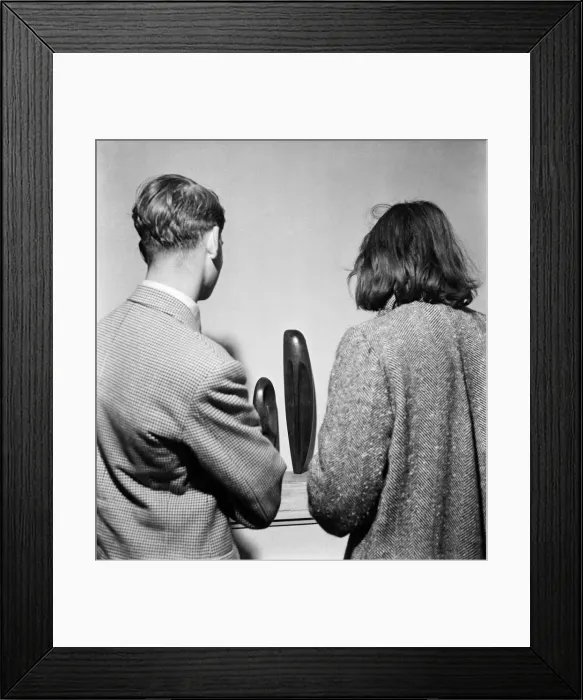 Framed Print : People examining pieces of art at the Exhibition of Sculpture at Burlington Galleries