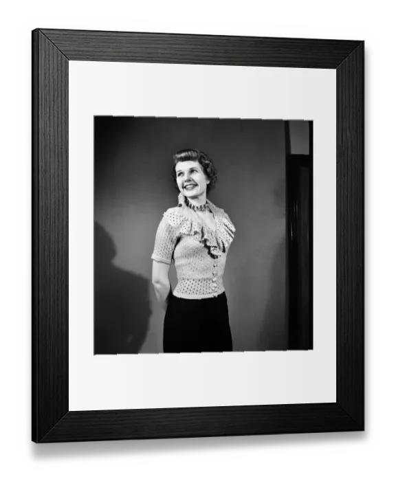 Framed Print : Sheila Sim is wearing frilly Jarnpon Blouse. February 1952 C6324 Framed Print : Sheila Sim is wearing frilly Jarnpon Blouse. February 1952 C6324