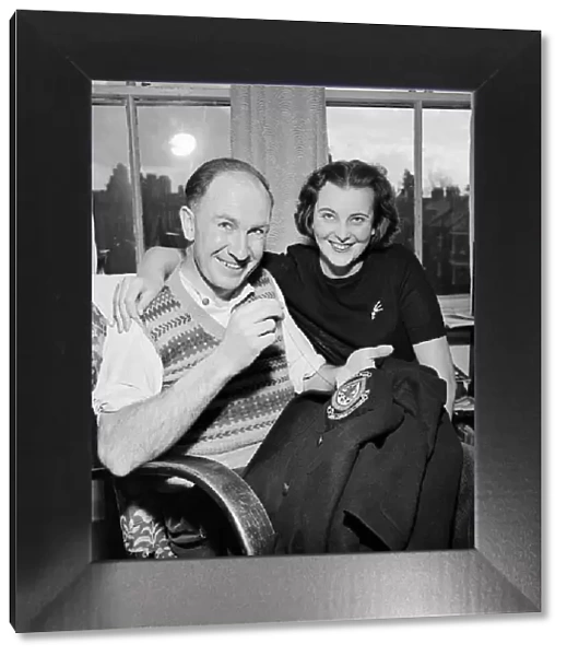 Bob Smith-Referee seen here at home with his wife. October 1952 C5210-002