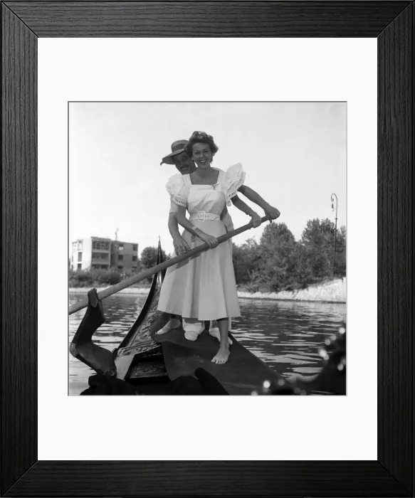 Framed Print : Ann French, actress posing with a gondolier in Venice, Italy. September 1952 C4555 Framed Print : Ann French, actress posing with a gondolier in Venice, Italy. September 1952 C4555
