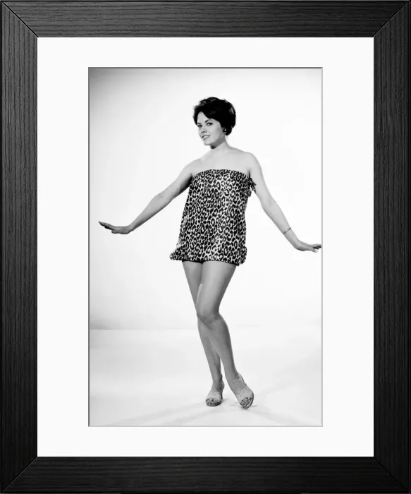 Framed Print : Actress and model Wendy Richard seen here modelling a leopard print beach dress Framed Print : Actress and model Wendy Richard seen here modelling a leopard print beach dress