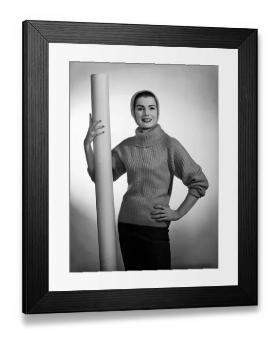 Framed Print : Pat Goodard seen here modeling a beige jumper with hood December 1956 Rev Framed Print : Pat Goodard seen here modeling a beige jumper with hood December 1956 Rev