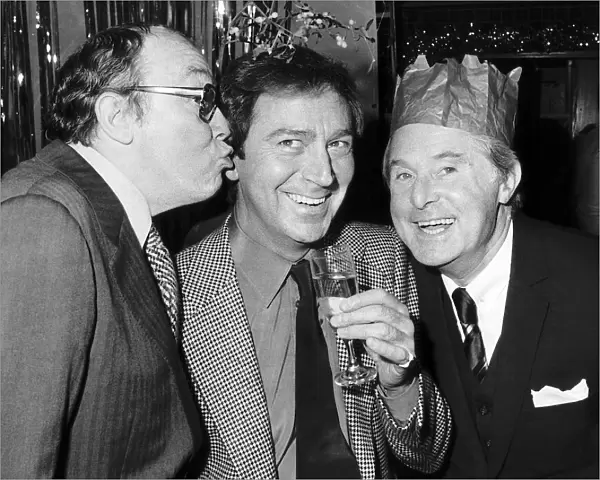 Morecambe and Wise with Des O Connor December 1982 sharing some christmas
