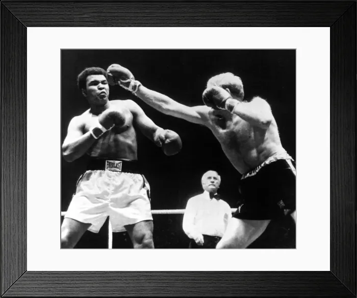 Framed Print : American Heavyweight Champion of the World Muhammad Ali in action against Richard Dunn of Framed Print : American Heavyweight Champion of the World Muhammad Ali in action against Richard Dunn of