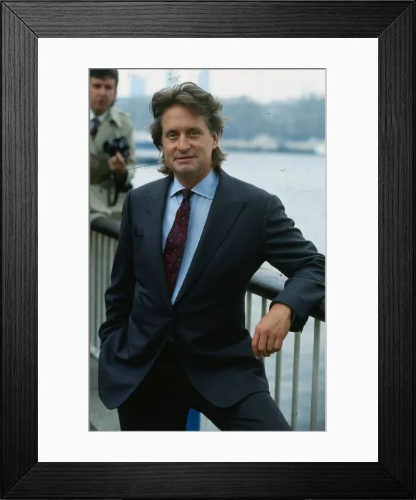 Framed Print : Michael Douglas actor April 1988 leaning on railing