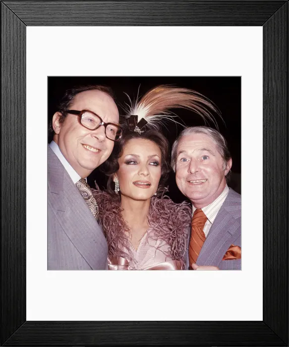 Framed Print : British comedy duo Ernie Wise and Eric Morecambe pose with Kate O Mara Framed Print : British comedy duo Ernie Wise and Eric Morecambe pose with Kate O Mara