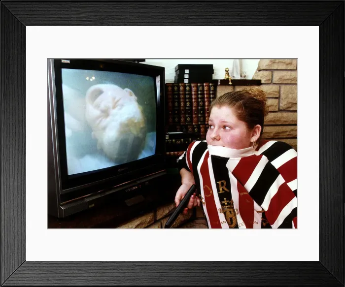 Framed Print : Louise Brown First test tube baby of the in virtro fertilisation technique watches her