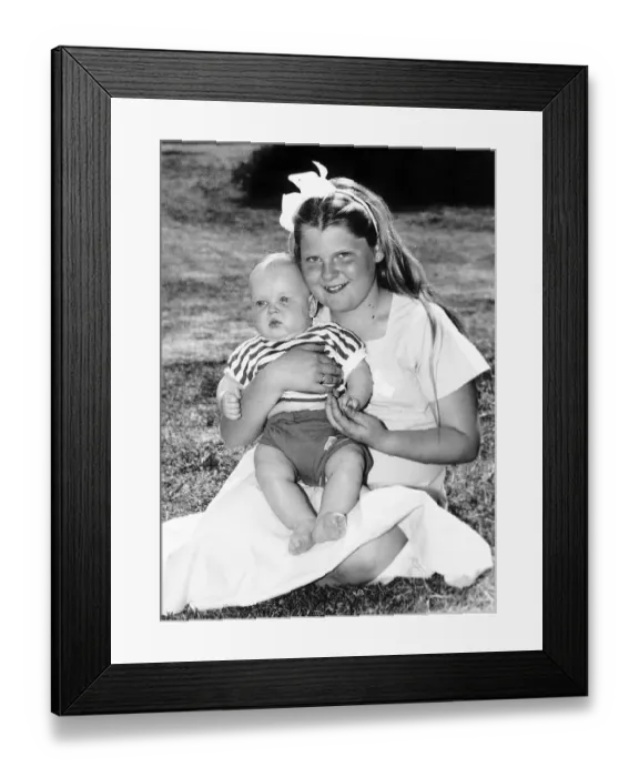 Framed Print : Louise Brown Test Tube Girl holding 6 month old Andrew Machea on her lap May 1989 Framed Print : Louise Brown Test Tube Girl holding 6 month old Andrew Machea on her lap May 1989