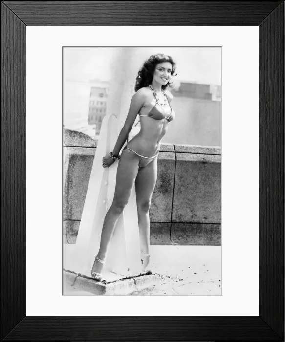Framed Print : Clothing - Beach. Lovely model Cossie struck a seasonal note yesterday with a brief Framed Print : Clothing - Beach. Lovely model Cossie struck a seasonal note yesterday with a brief