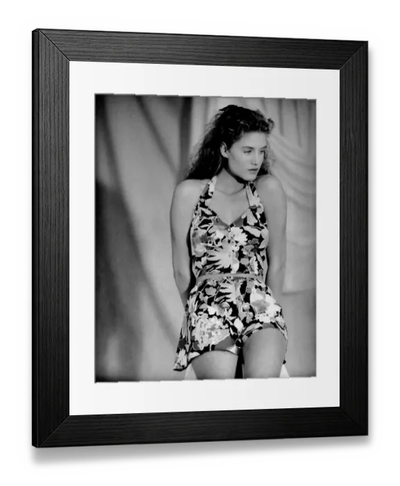 Framed Print : Clothing Beach. Top marks: Fashion like this halterneck floral sun suit helped to Framed Print : Clothing Beach. Top marks: Fashion like this halterneck floral sun suit helped to