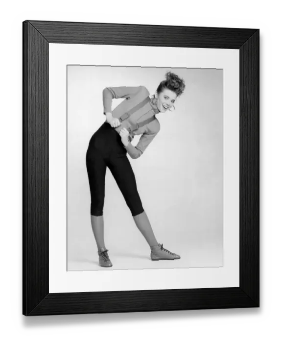 Framed Print : Fashion - Shorts: Black cycling shorts, long-sleeved zipped polo neck top and braces