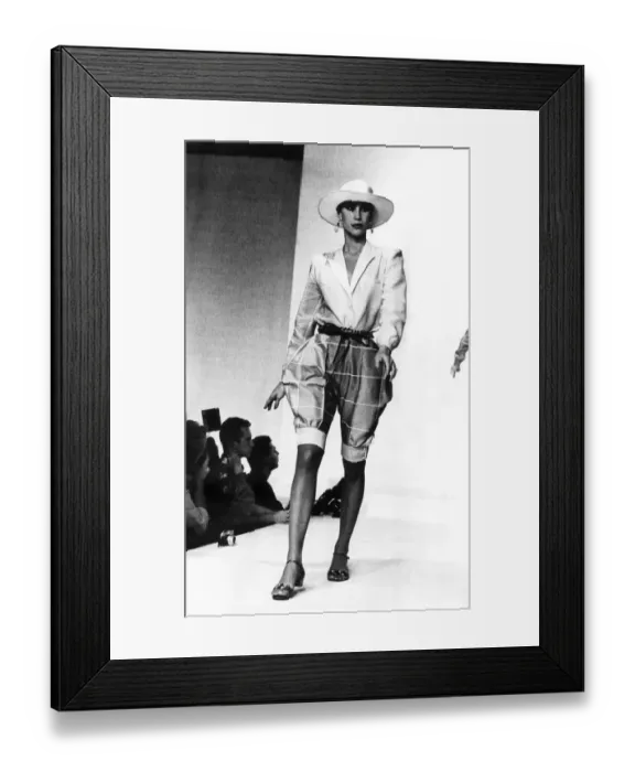 Framed Print : Fashion - Shorts: Valentino. Model wears checked flared jodhpurs shorts with jacket Framed Print : Fashion - Shorts: Valentino. Model wears checked flared jodhpurs shorts with jacket