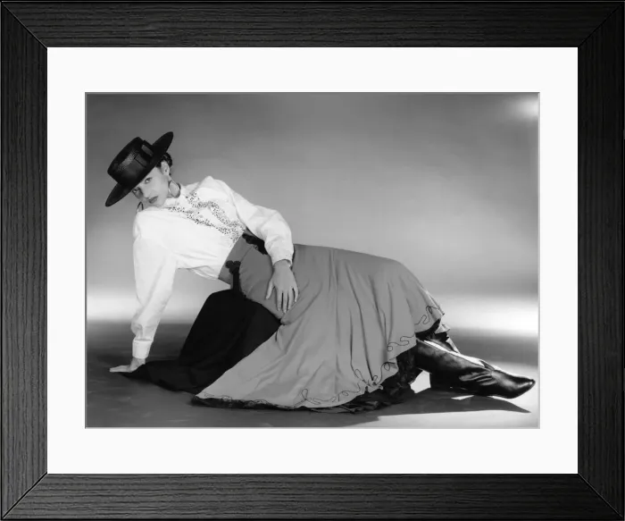 Framed Print : Fashion - Skirts. Model wears long riding skirt, long boots Framed Print : Fashion - Skirts. Model wears long riding skirt, long boots