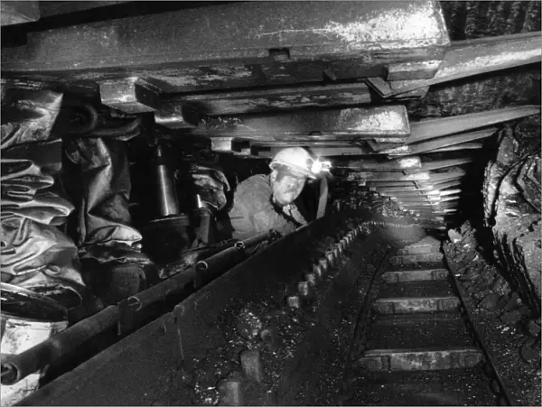 A miner at work underground in a coal mine. August 1984 P017840