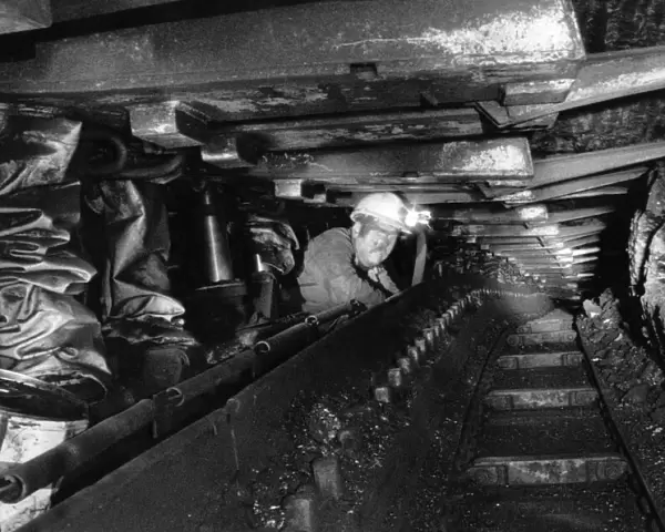A miner at work underground in a coal mine. August 1984 P017840