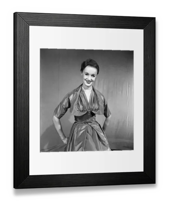 Framed Print : Woman poses wearing a long evening dress. November 1952 C6275