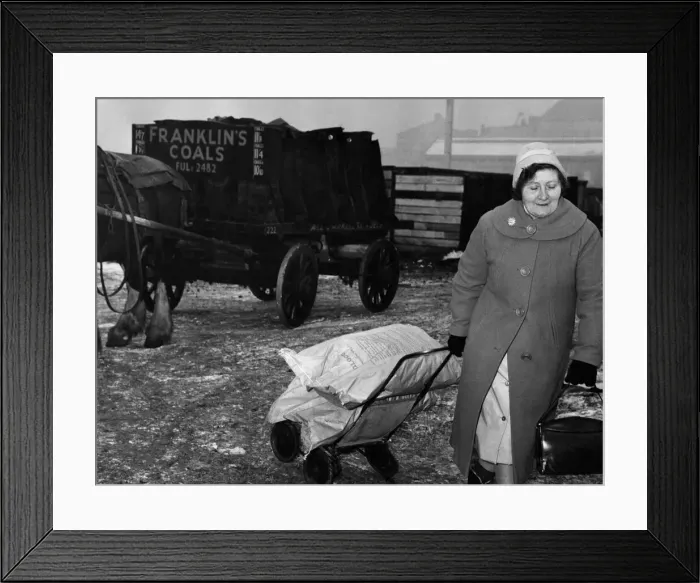 Framed Print : The coal shortage has hit many homes this winter, contractors are low if not out of Framed Print : The coal shortage has hit many homes this winter, contractors are low if not out of