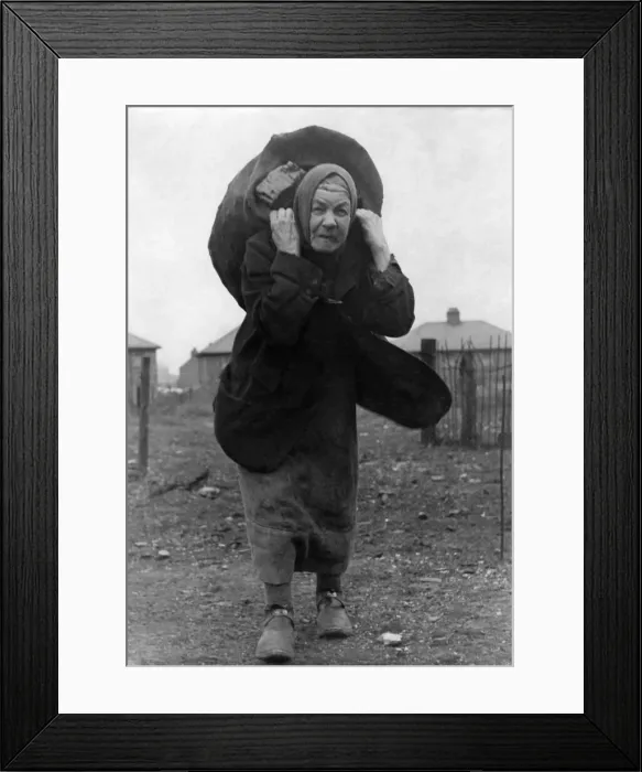 Framed Print : Mrs. Mary Fagan carrying a large sack of coal on her back at St Framed Print : Mrs. Mary Fagan carrying a large sack of coal on her back at St