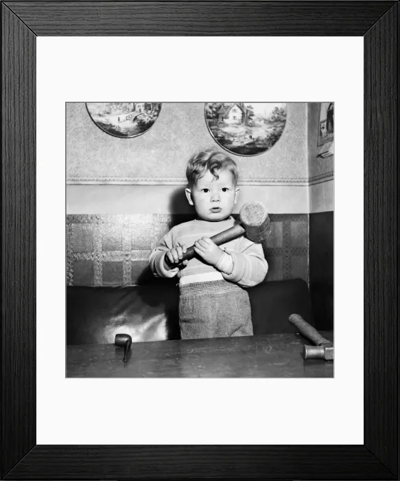 Framed Print : Young toddler boy holding a heavy hammer December 1952 C6391-004 Framed Print : Young toddler boy holding a heavy hammer December 1952 C6391-004