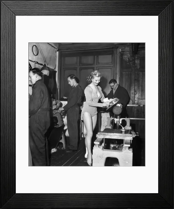 Framed Print : Skater Sheila Hamilton gets her skates put on for her performance in Framed Print : Skater Sheila Hamilton gets her skates put on for her performance in