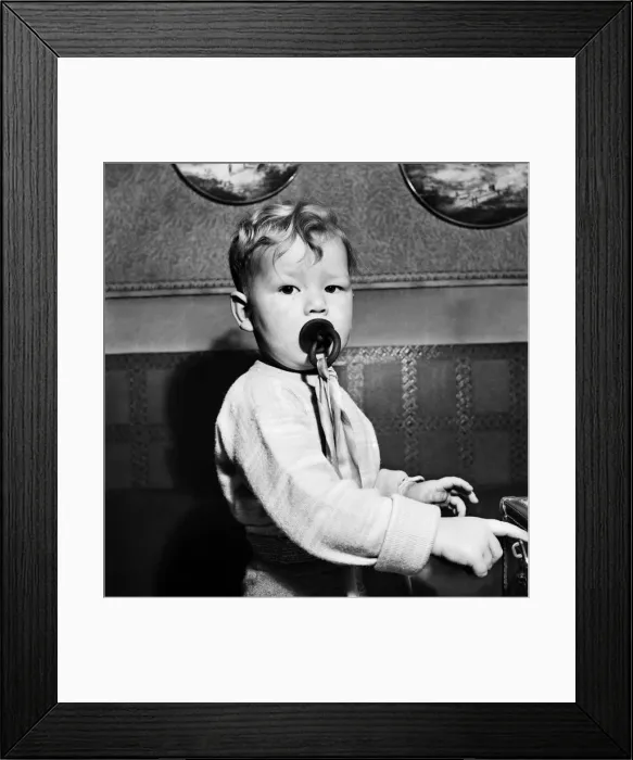 Framed Print : Young toddler boy sucking on a dummy December 1952 C6391-006 Framed Print : Young toddler boy sucking on a dummy December 1952 C6391-006