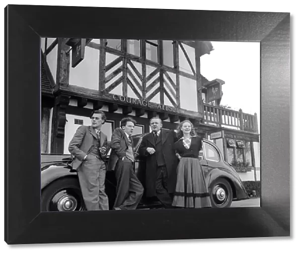 Artist couple Richard and Pat Larter with friends outside their local pub