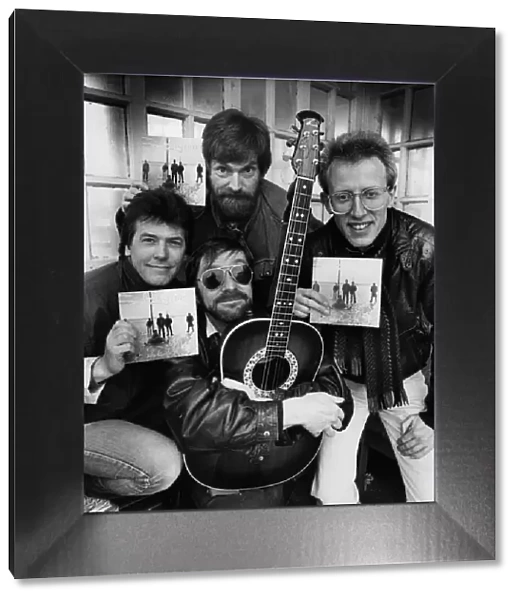 Lindisfarne with their new record... left to right, Marty Craggs, Alan Hull