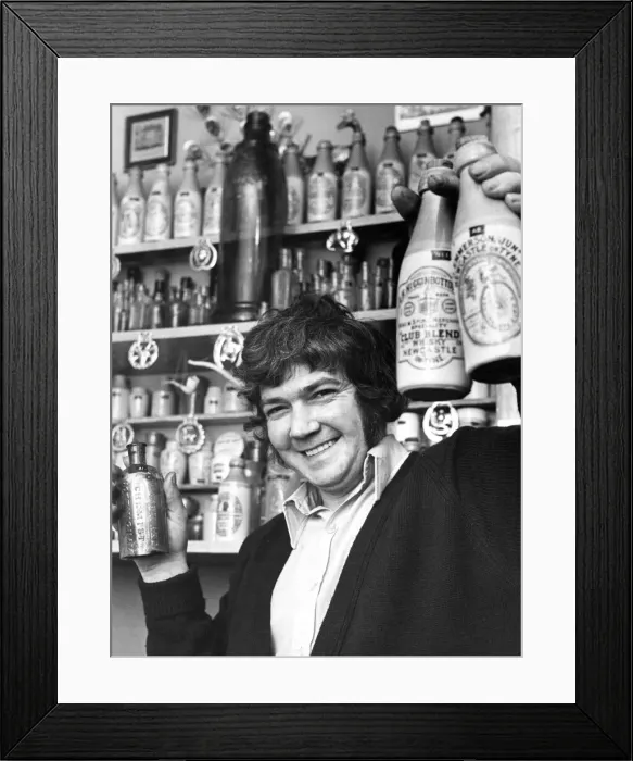 Framed Print : Dave Gegg with part of his collection of old bottles Framed Print : Dave Gegg with part of his collection of old bottles