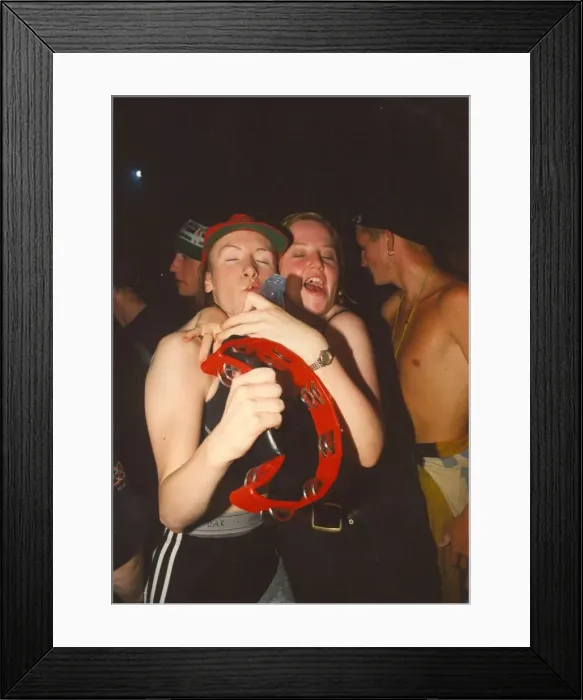 Framed Print : Clubbers get hot and sweaty enjoying a rave Framed Print : Clubbers get hot and sweaty enjoying a rave