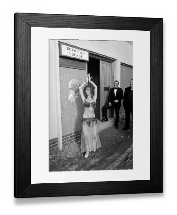 Framed Print : A woman belly dancing for men at The Turks Head Pub in Birmingham Framed Print : A woman belly dancing for men at The Turks Head Pub in Birmingham