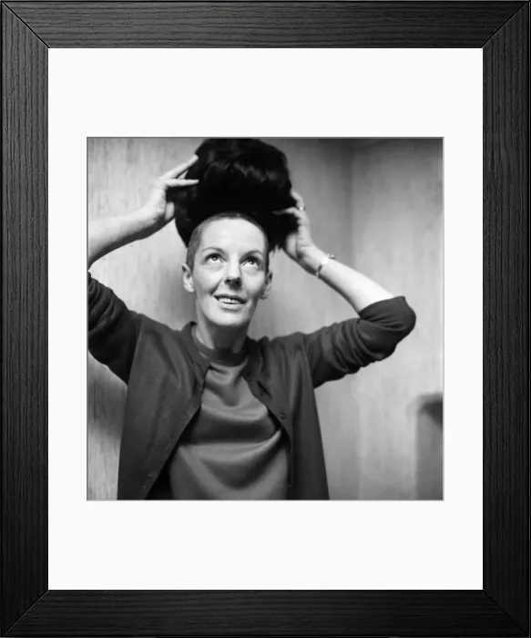 Framed Print : Woman with a bald head, with her wig. November 1969 Z11155-002