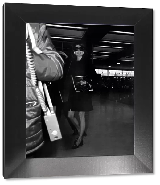 Mrs. Jacqueline Kennedy Onassis arrives at Heathrow Airport by Olympic Airways