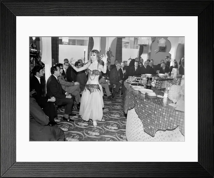 Framed Print : A woman belly dancing for men at The Turks Head Pub in Birmingham Framed Print : A woman belly dancing for men at The Turks Head Pub in Birmingham