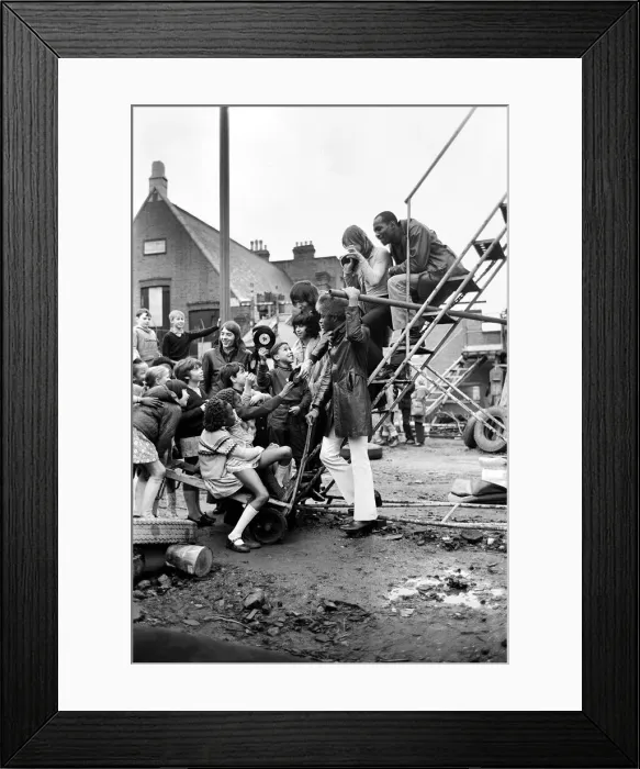 Framed Print : The Foundations pop group surrounded by children at the Notting Hill playground Framed Print : The Foundations pop group surrounded by children at the Notting Hill playground