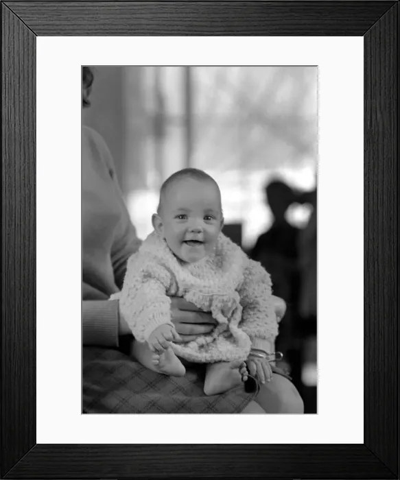 Framed Print : Eight month old baby girl pictured at home with her mother