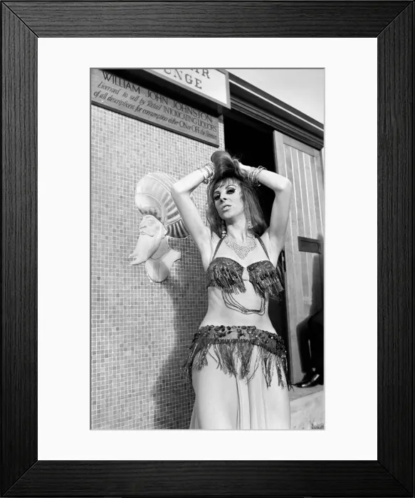 Framed Print : A woman belly dancing for men at The Turks Head Pub in Birmingham. November 1969 Z11189 Framed Print : A woman belly dancing for men at The Turks Head Pub in Birmingham. November 1969 Z11189