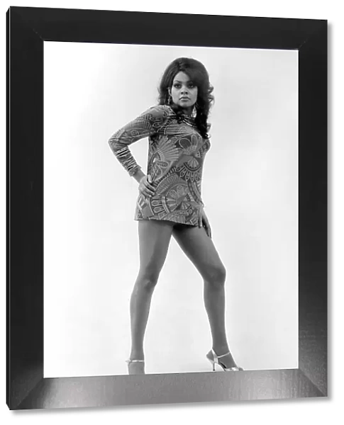 Model Vicki Richards wearing a patterned mini dress. October 1969 Z10451-002
