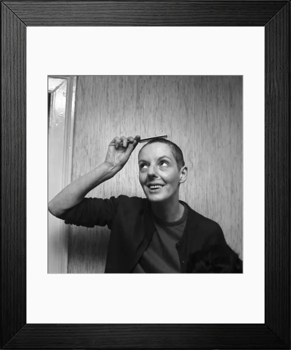 Framed Print : Woman with a bald head, with her wig. November 1969 Z11155-005