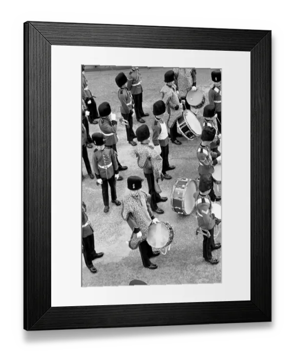 Framed Print : One bass drummer from the Coldstream Guards who found a way of beating the cold by Framed Print : One bass drummer from the Coldstream Guards who found a way of beating the cold by