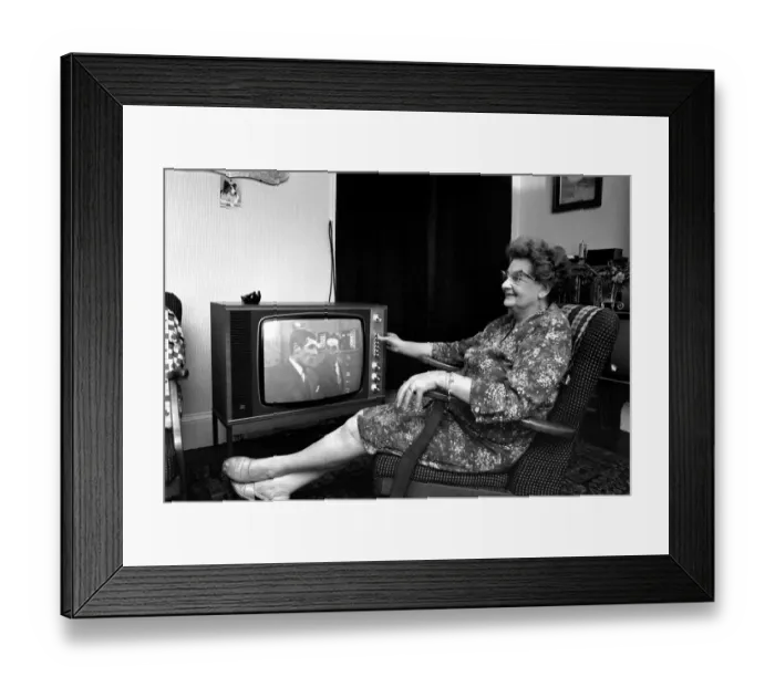 Framed Print : Mrs. Christina Teatheredge of South West London watches Z cars in black Framed Print : Mrs. Christina Teatheredge of South West London watches Z cars in black
