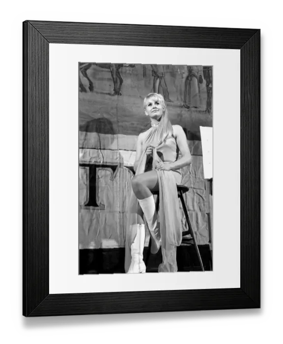 Framed Print : 23 year old actress singer Thelma Taylor sits on the stage at the London Palladium during Framed Print : 23 year old actress singer Thelma Taylor sits on the stage at the London Palladium during