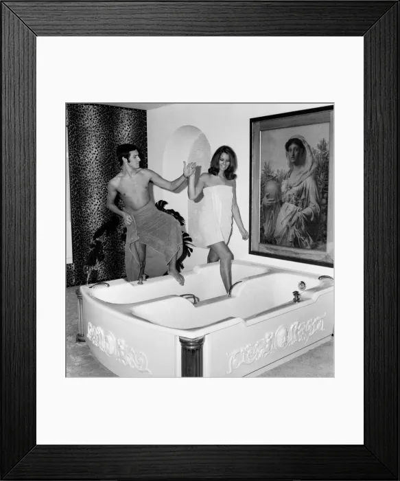 Framed Print : Man and woman sharing a bath. November 1969 Z10586-003