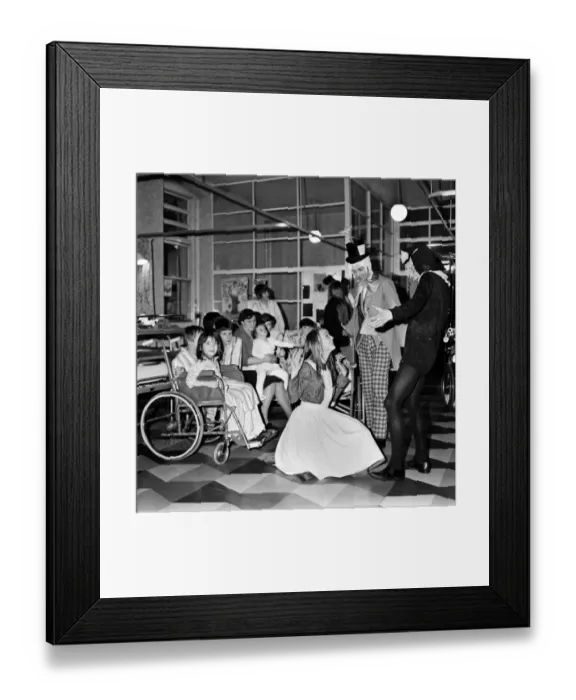 Framed Print : Children of Booth Hall Hospital meet character from Alice in Wonderland Framed Print : Children of Booth Hall Hospital meet character from Alice in Wonderland
