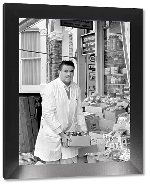 A man sitting in his shop at Deptford. November 1969 Z10715-001