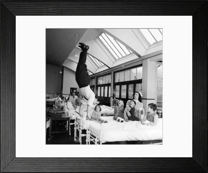 Framed Print : Acrobat Fred Edwards performing at a childrens hospital. May 1953 D2247-001 Framed Print : Acrobat Fred Edwards performing at a childrens hospital. May 1953 D2247-001