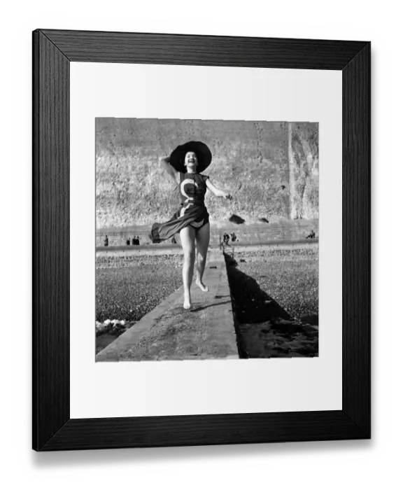Framed Print : Holiday Fashion 1953 Christina Chandler models a coronation swimsuit Framed Print : Holiday Fashion 1953 Christina Chandler models a coronation swimsuit