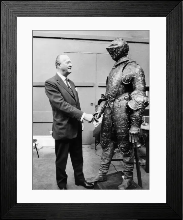 Framed Print : A suit was sold for £1, 950, 000 this morning by telephone