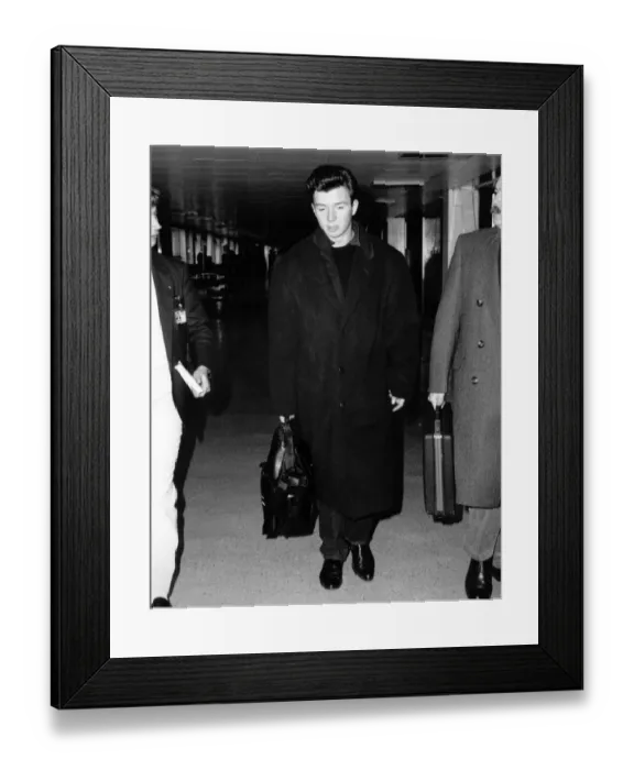 Framed Print : Pop singer Rick Astley was at Heathrow Airport yesterday Framed Print : Pop singer Rick Astley was at Heathrow Airport yesterday